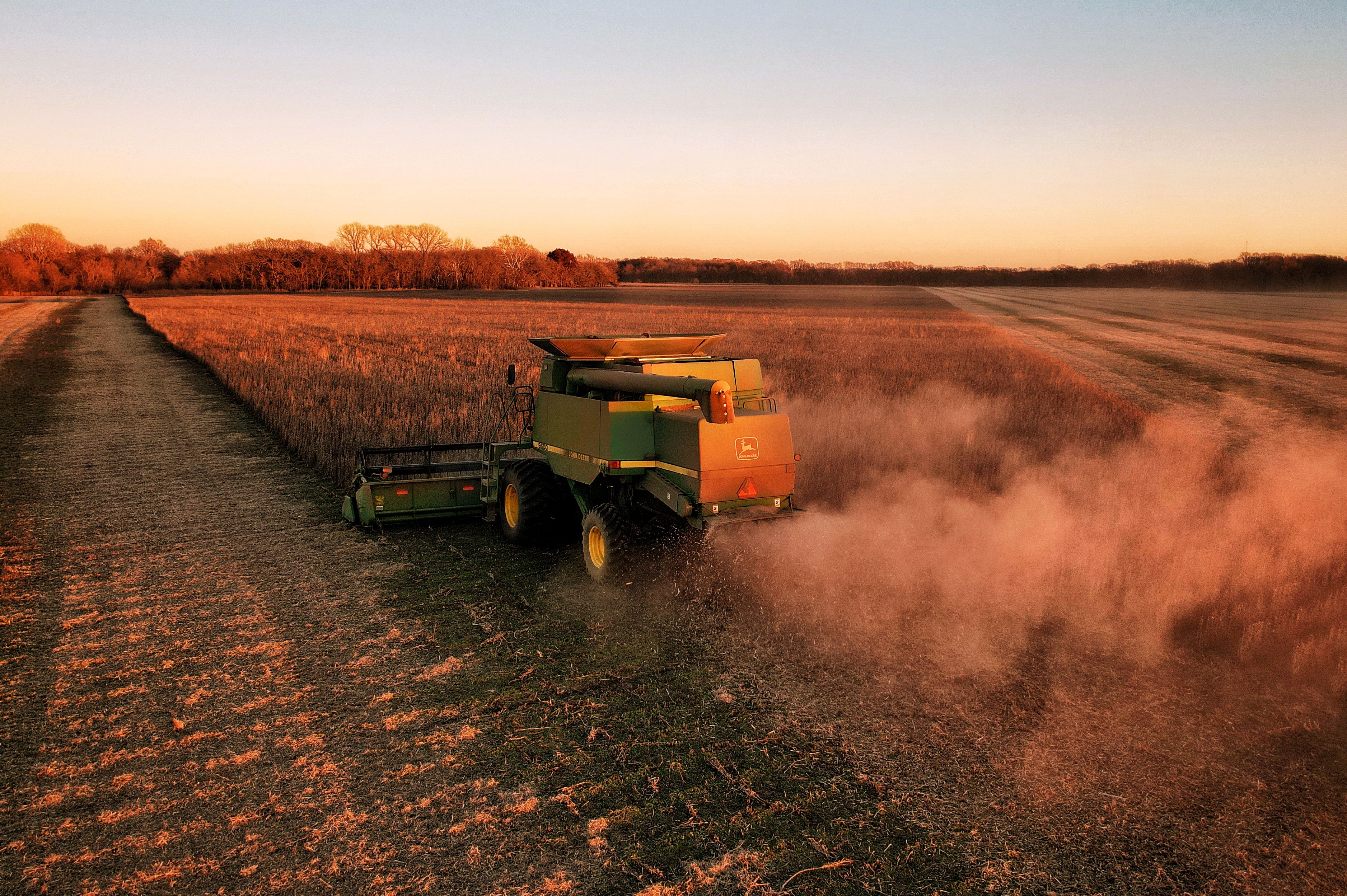 Combine harvesting a field